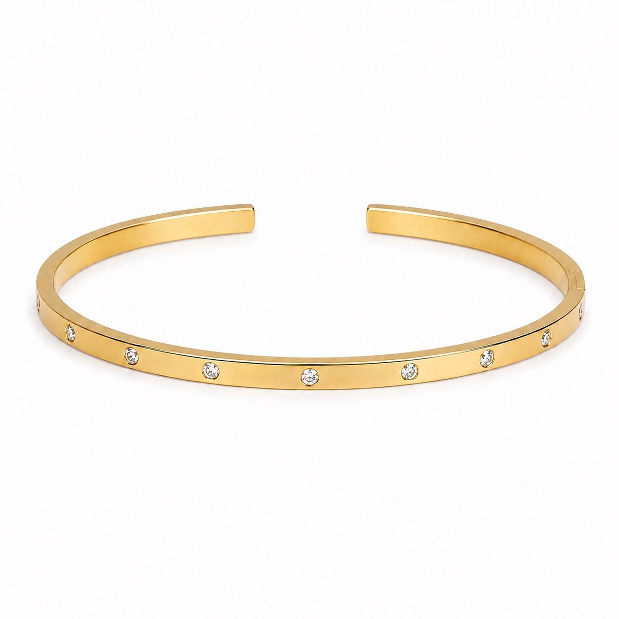 Brazalete Destello dorado abierto de banda fina con detalles brillantes redondos