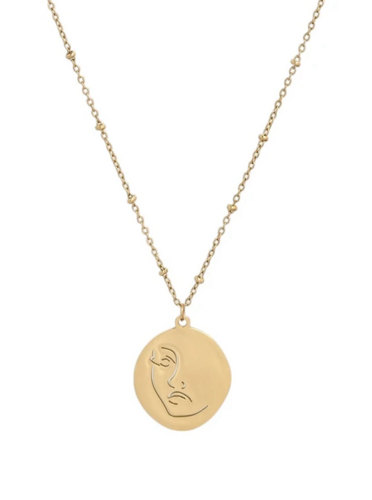 Collar Mística dorado con rostro minimalista grabado de ALMADIVERSA