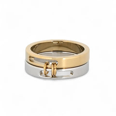 Anillo doble de acero inoxidable en plata y dorado con unión metálica frontal. Joyería unisex genderless