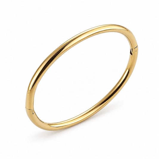 Brazalete Nexo dorado de acero, forma ovalada y apertura lateral