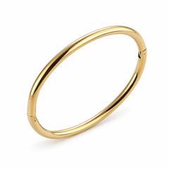 Brazalete Nexo dorado de acero, forma ovalada y apertura lateral