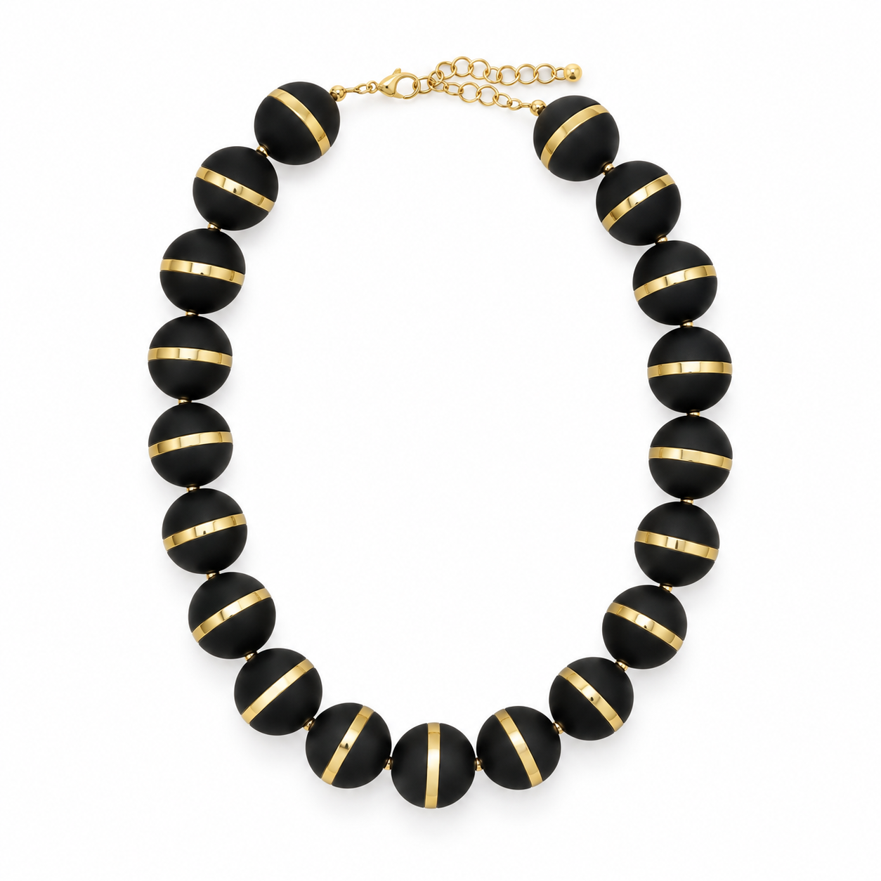 Collar Órbita negro de bolas con franja dorada sobre fondo blanco