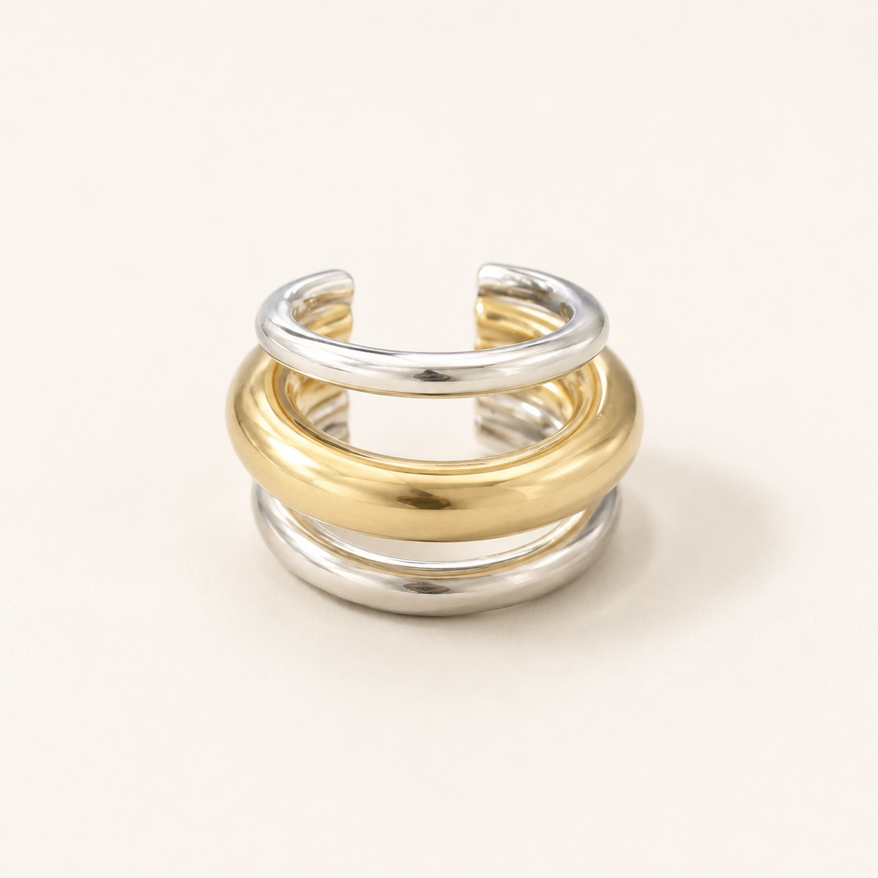 Ear cuff bicolor de acero 316L en dorado y plateado